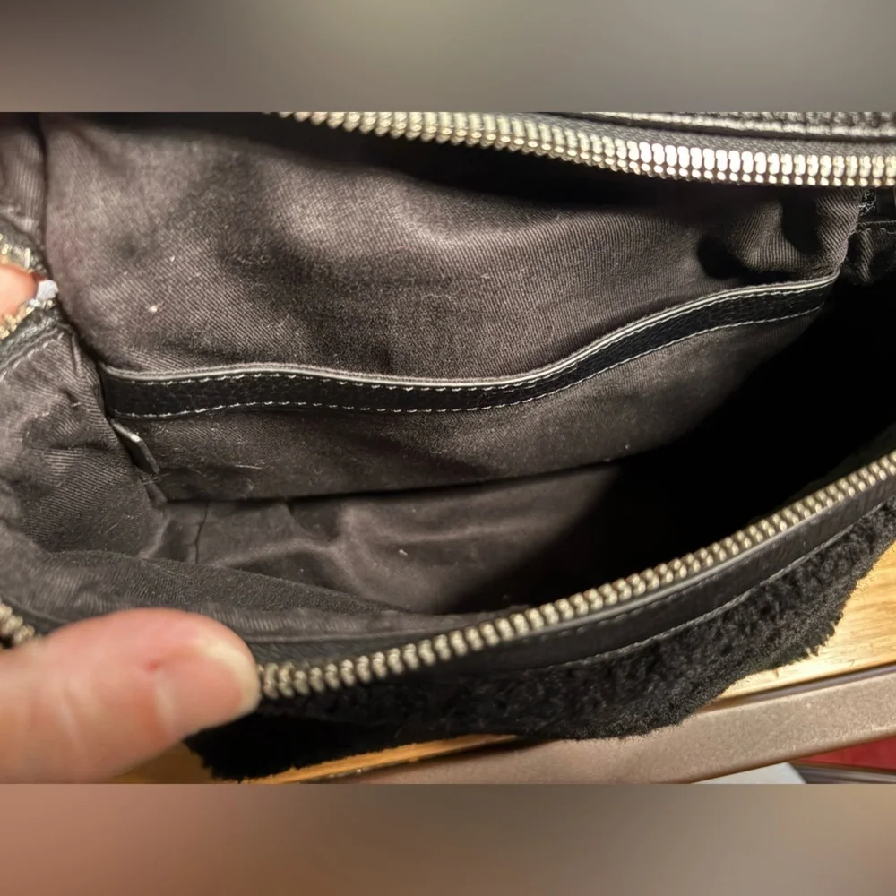 EUC KARA- Small Backpack in Black Shearling and Pebbled Leather.
